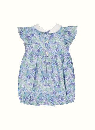 Hetty Hand Smocked Floral Romper in Blue